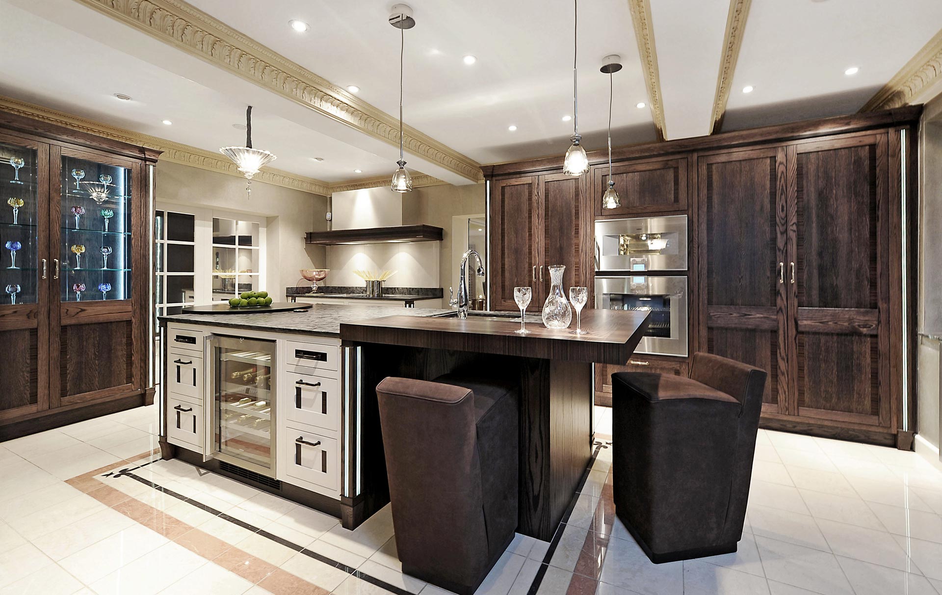 Bespoke Kitchen Design, Hepburn Kitchen by Dream Design. Featuring bespoke cabinetry, granite worktop, breakfast bar, bar stools, Gaggenau appliances and Baccarat lighting.